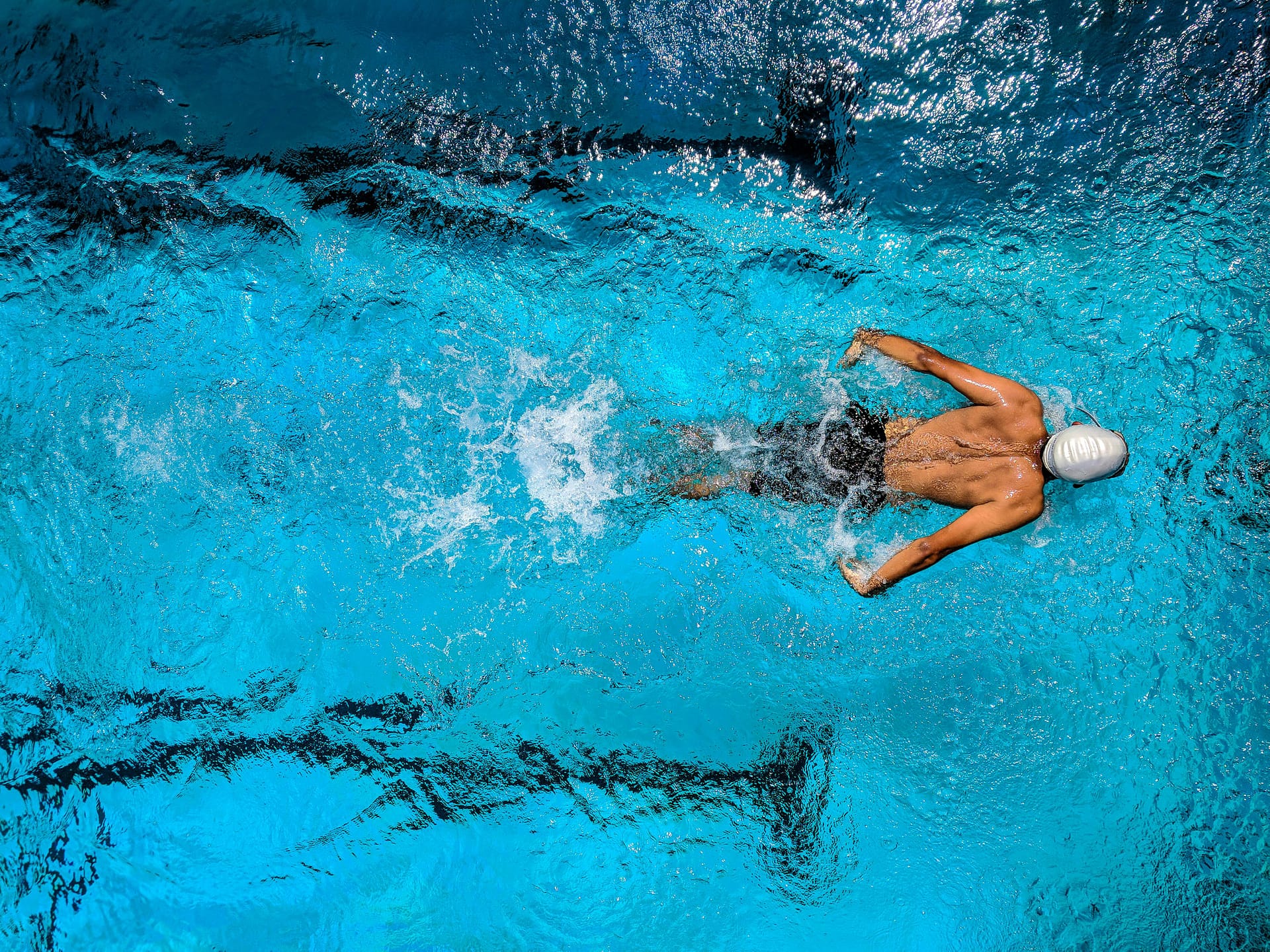 Image of swimmer. the power of positive habits