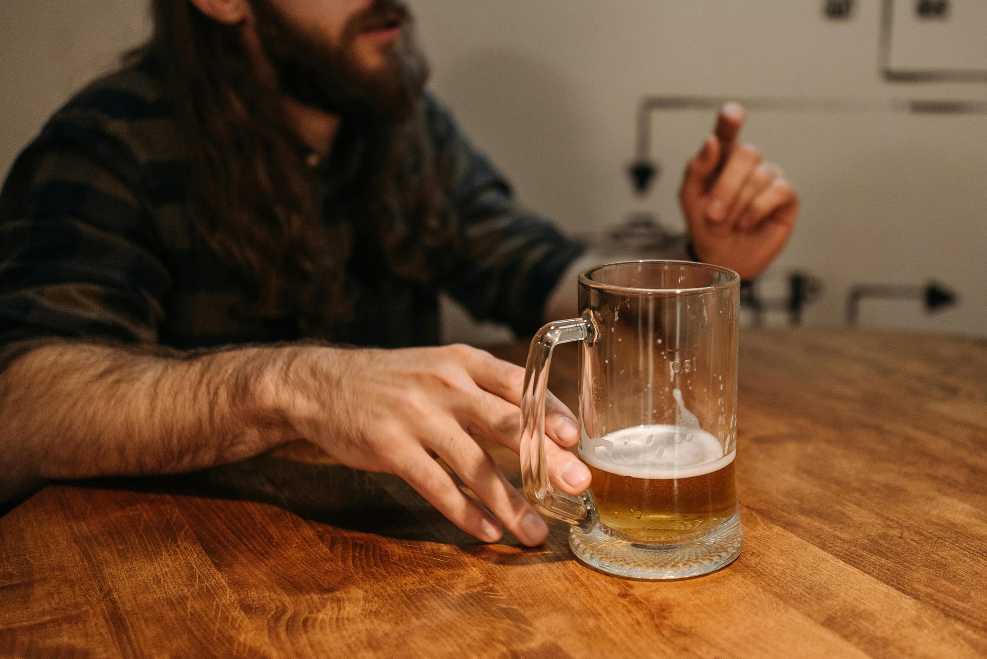 image of man drinkong beer. Alcoholism, a dysfunctional behaviour bordering on insanity